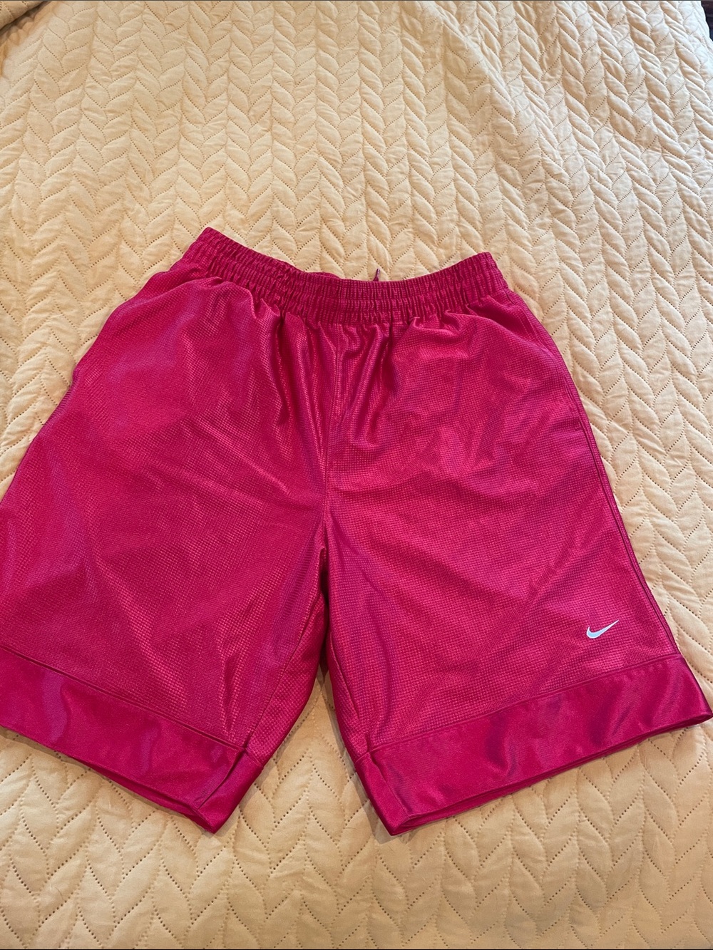 Nike men’s Red basketball shorts, size medium